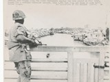 1968-14-07 7th Division soldier stands guard on bridge y leading into Saigon1